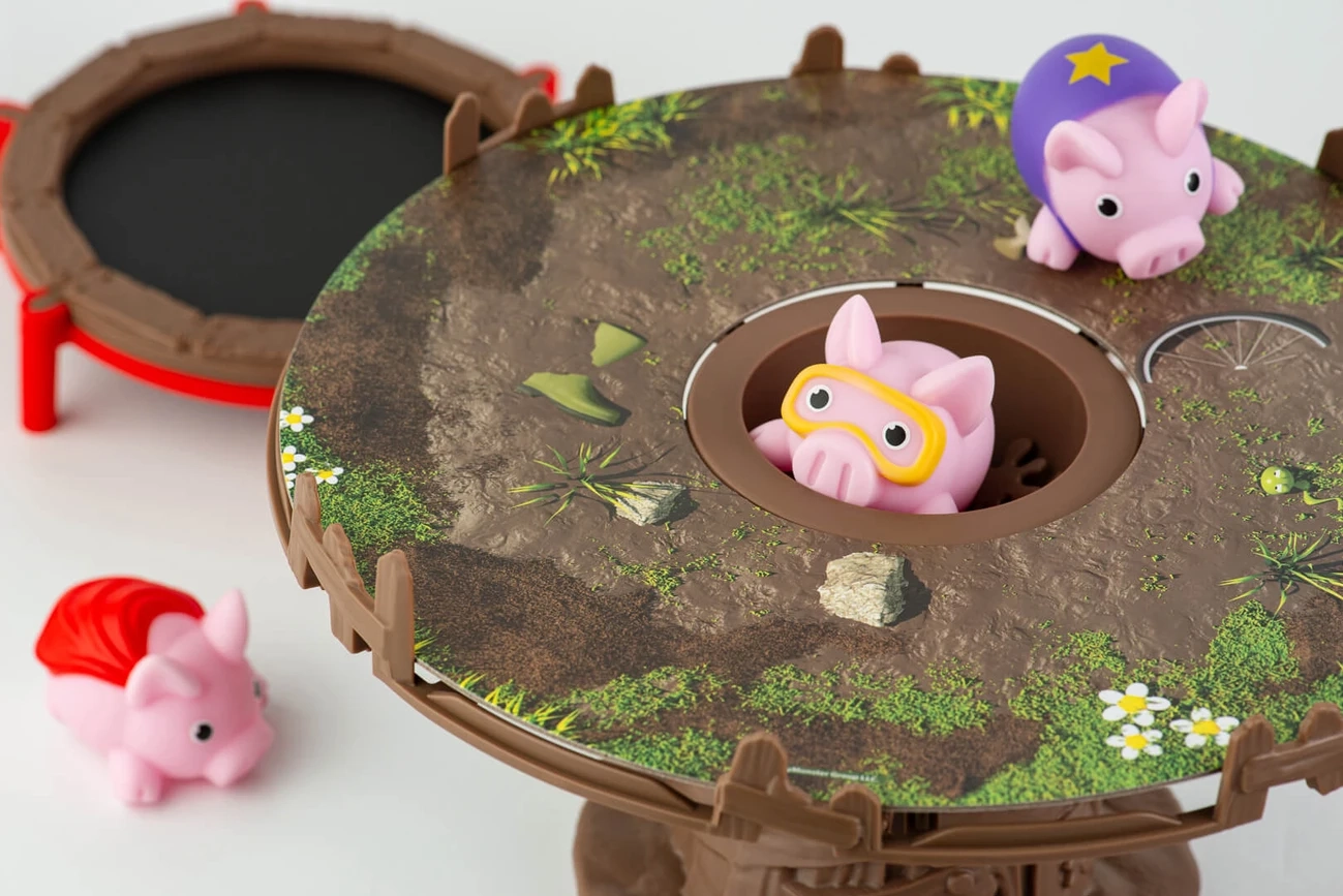 Настольная игра Хрюшки - попригушки (Pigs on Trampolines), бренду Fun Games Shop, для 2-4 гравців, час гри < 30мин. - 5 - KUBIX 