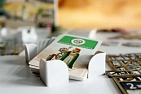 Миниатюра товара Настольная игра 7 Wonders Architects (FR) (+ укр. наклейки + QR-код с укр. правилами) - 4